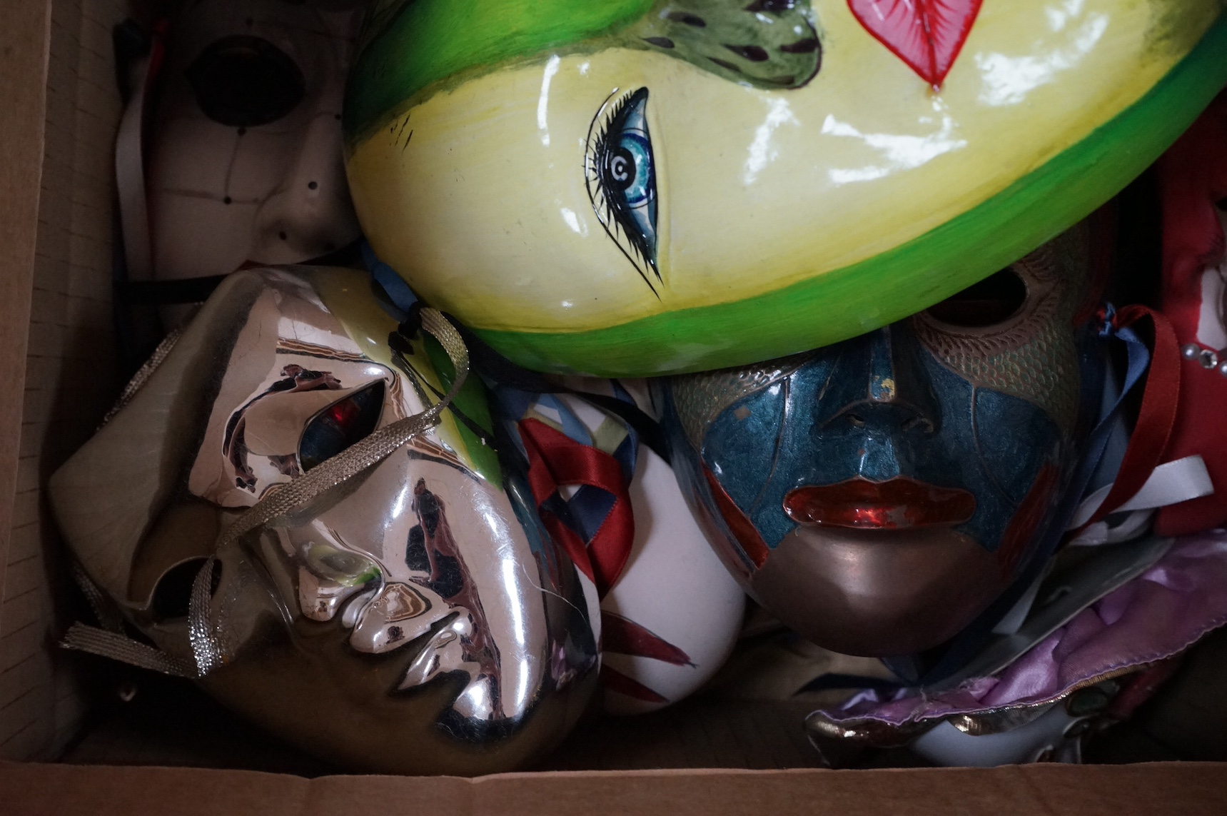 A large collection of various painted wall masks. Condition - varies